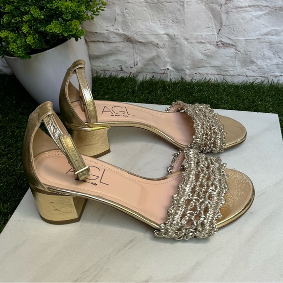 AGL
Crochet Penny Block Heel Sandal in Golden Platino color size 36.5 US 6.5 - Picture 8 of 14